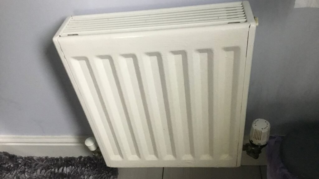 A domestic radiator on a household wall