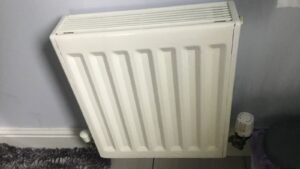 A domestic radiator on a household wall