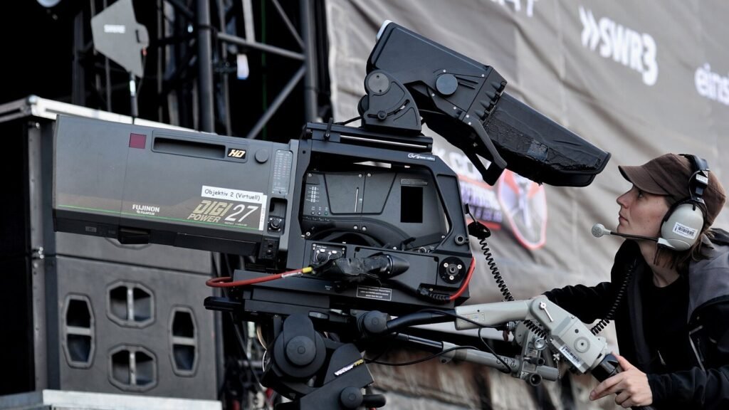 A professional film camera on set during a production shoot