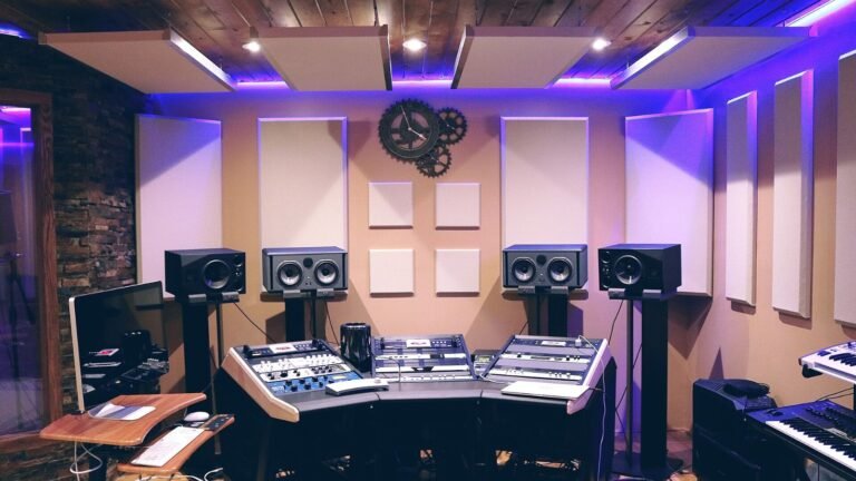 A professional recording studio control room with mixing desk